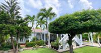 415665, Immaculate Triplex with Tropical Oasis & Rental Income Potential