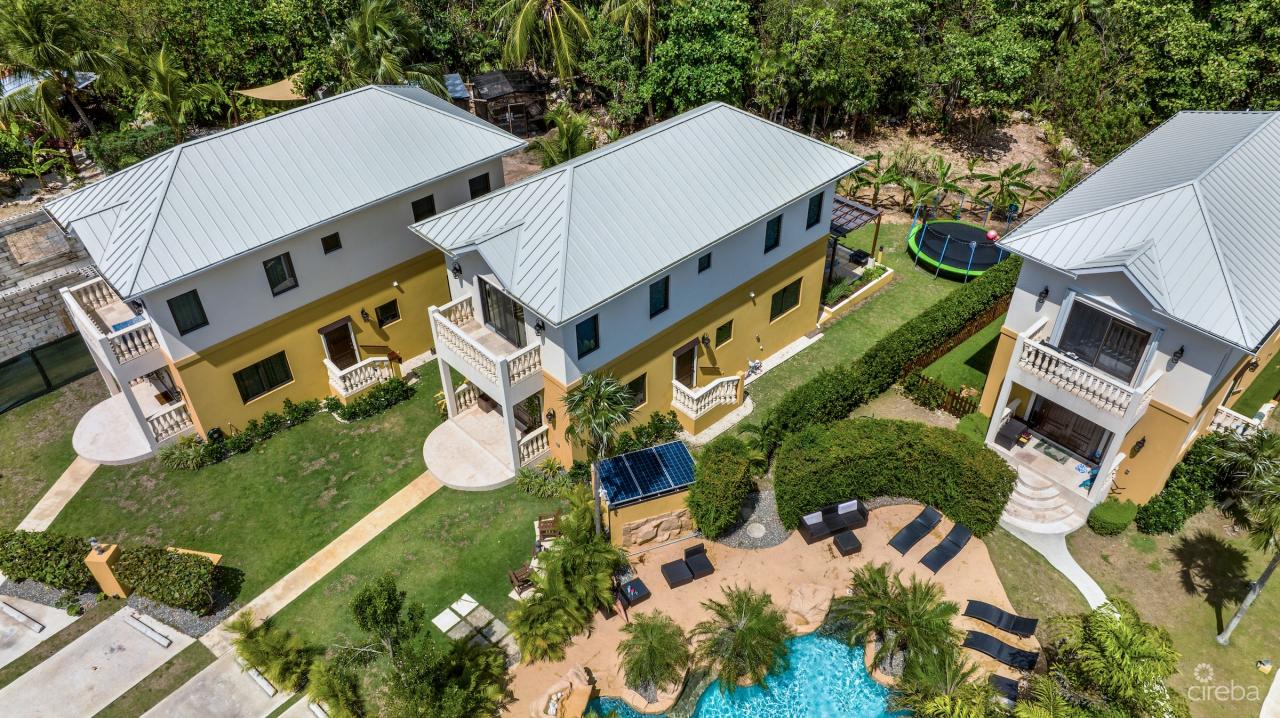 Villa #4 was completed in fall of 2022 and built with quality materials like standing seam roof, reinforced block concrete walls and impact rated windows and doors.