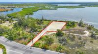 417447, LITTLE SOUND BEACHFRONT LOT IN CAYMAN KAI/RUM POINT WITH PRIVATE ROAD ACCESS